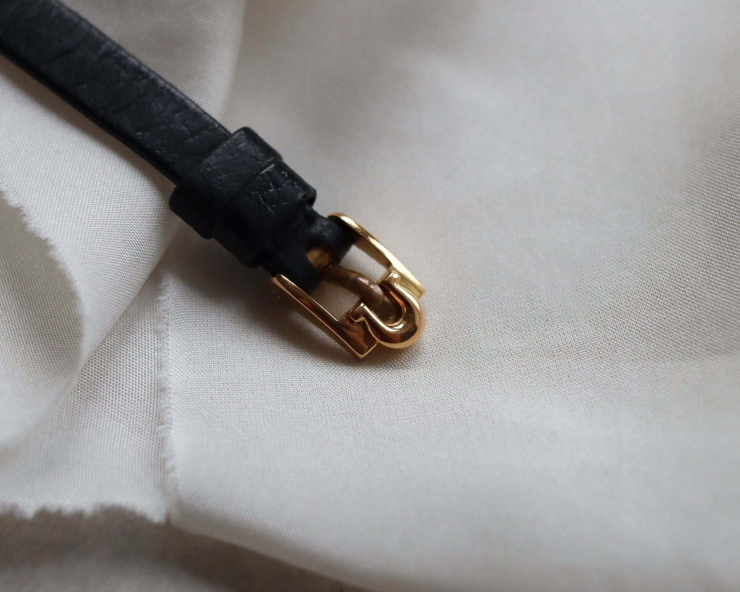 18ct gold Omega Saphette with black leather strap 1958