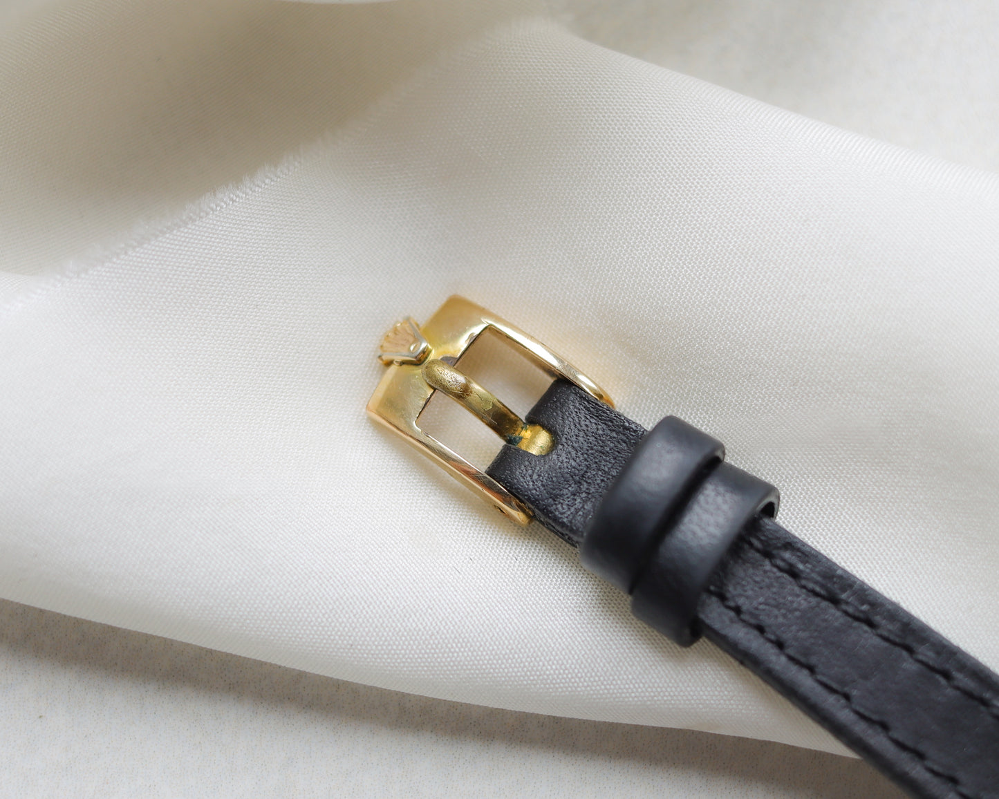 18ct gold Rolex Precision black leather watch with pink clamshell box