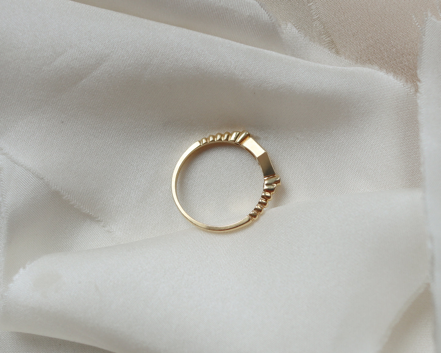 Statement 18ct gold trapeze sapphire and diamond ring UK K