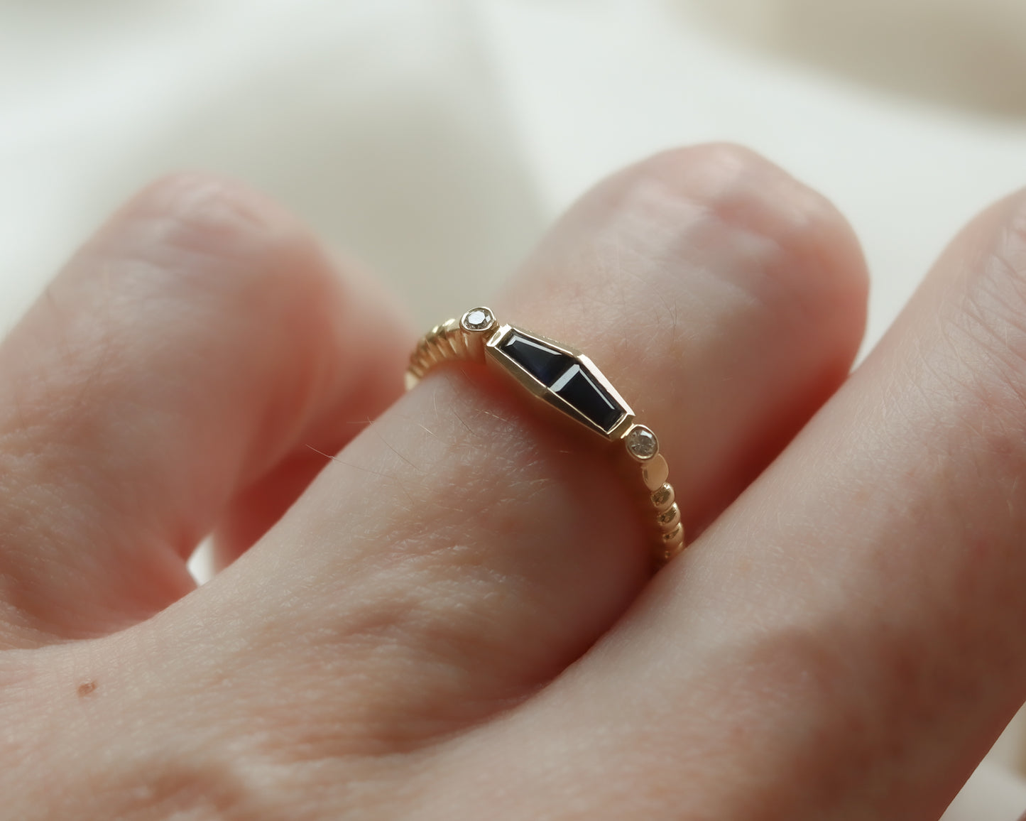 Statement 18ct gold trapeze sapphire and diamond ring UK K