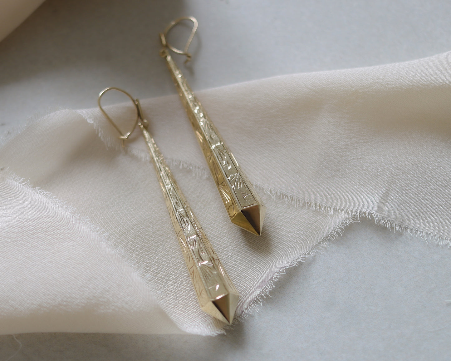 Dramatic pendulum drop floral etched dangle earrings