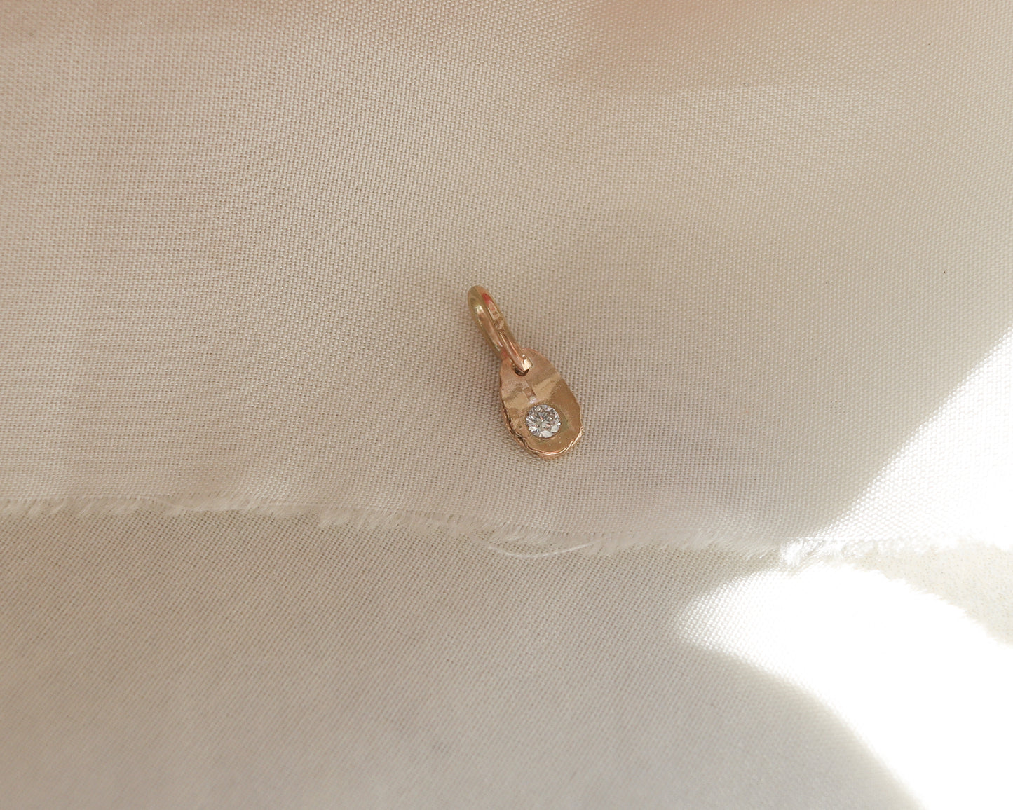 9ct rose gold rustic oval larger diamond charm