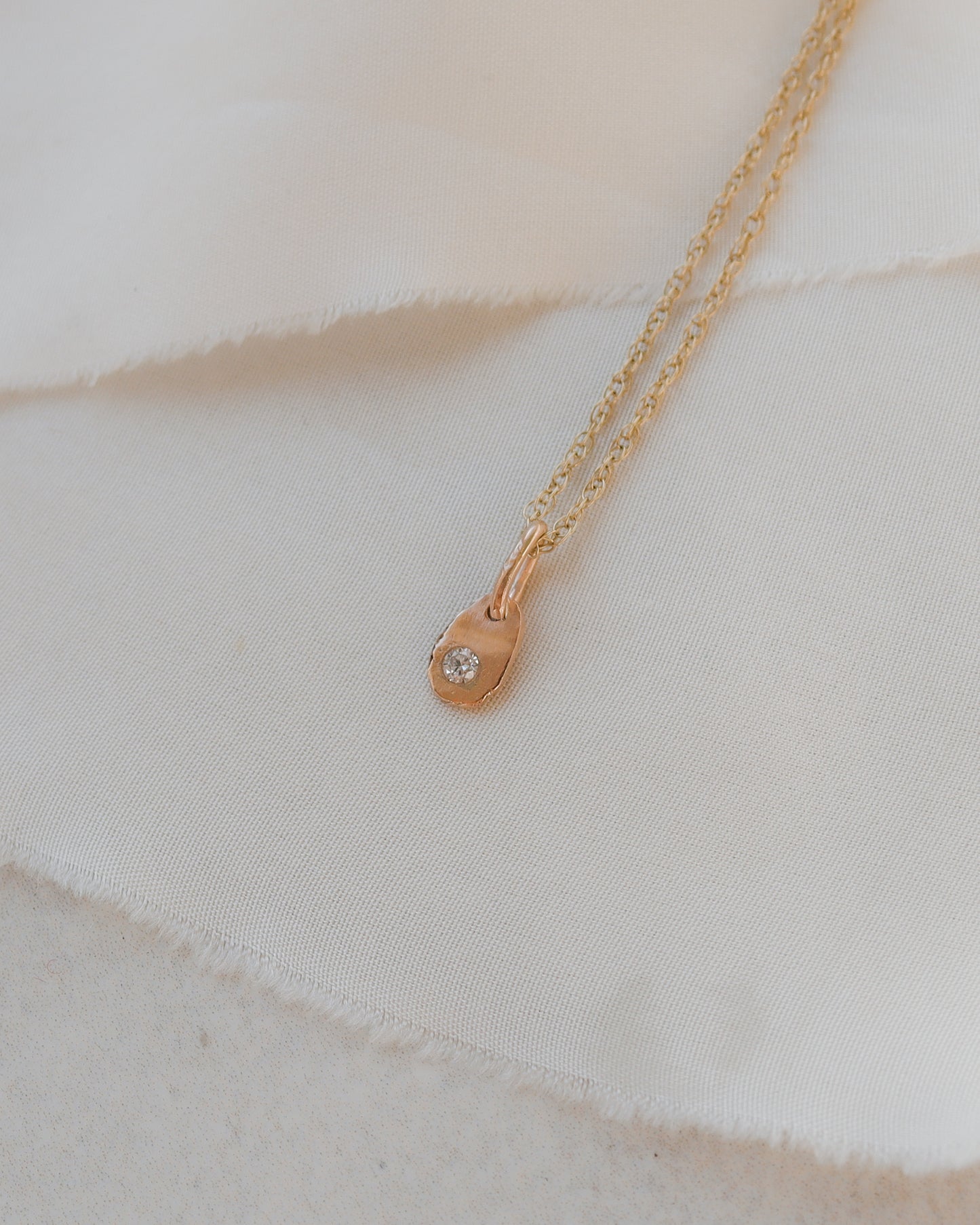 9ct rose gold rustic oval larger diamond charm