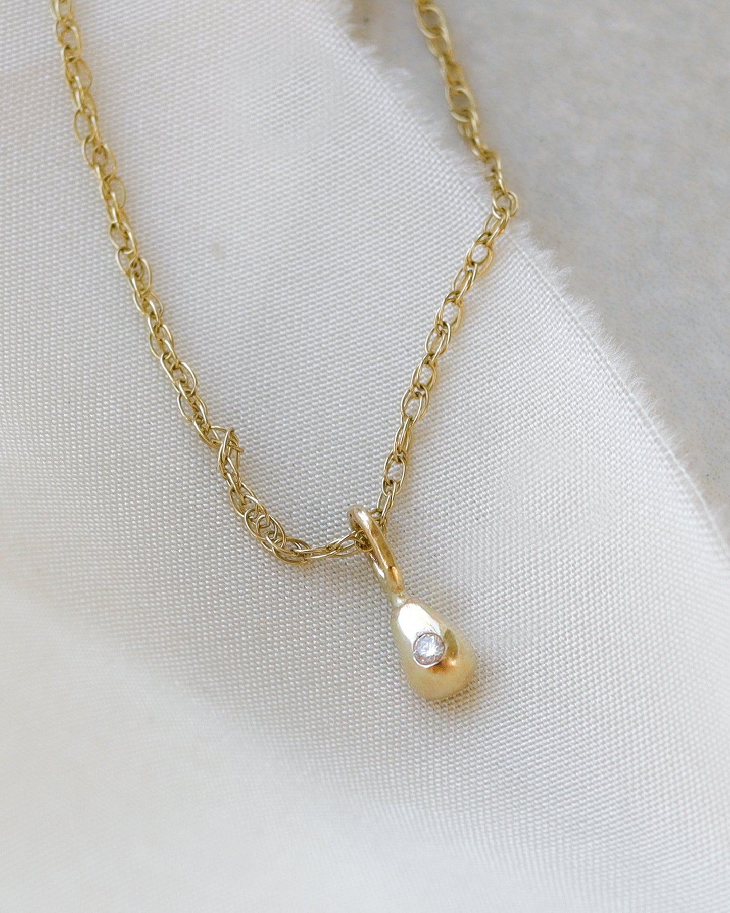9ct yellow gold tear drop diamond charm pendant