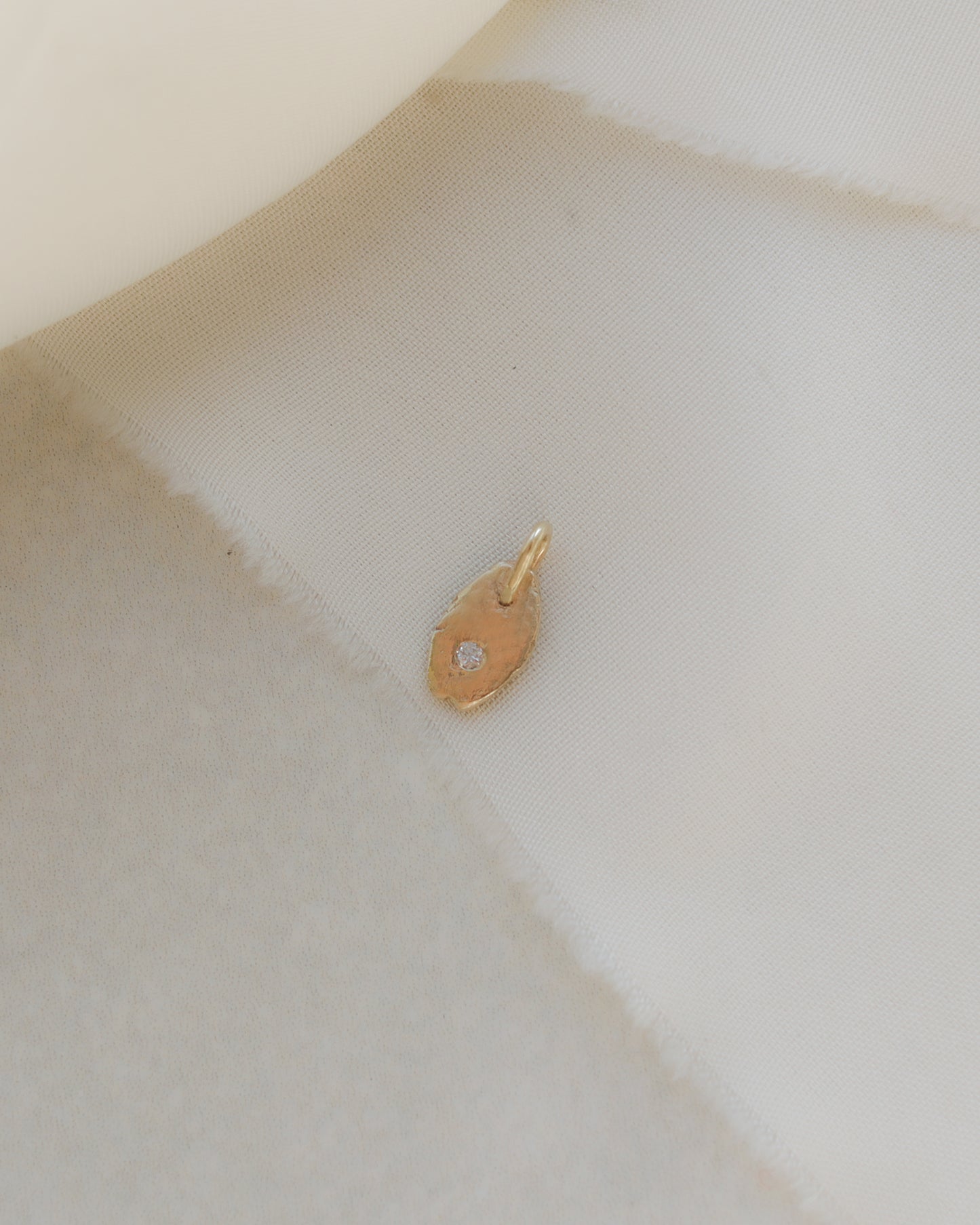 9ct yellow gold rustic oval smaller diamond charm pendant