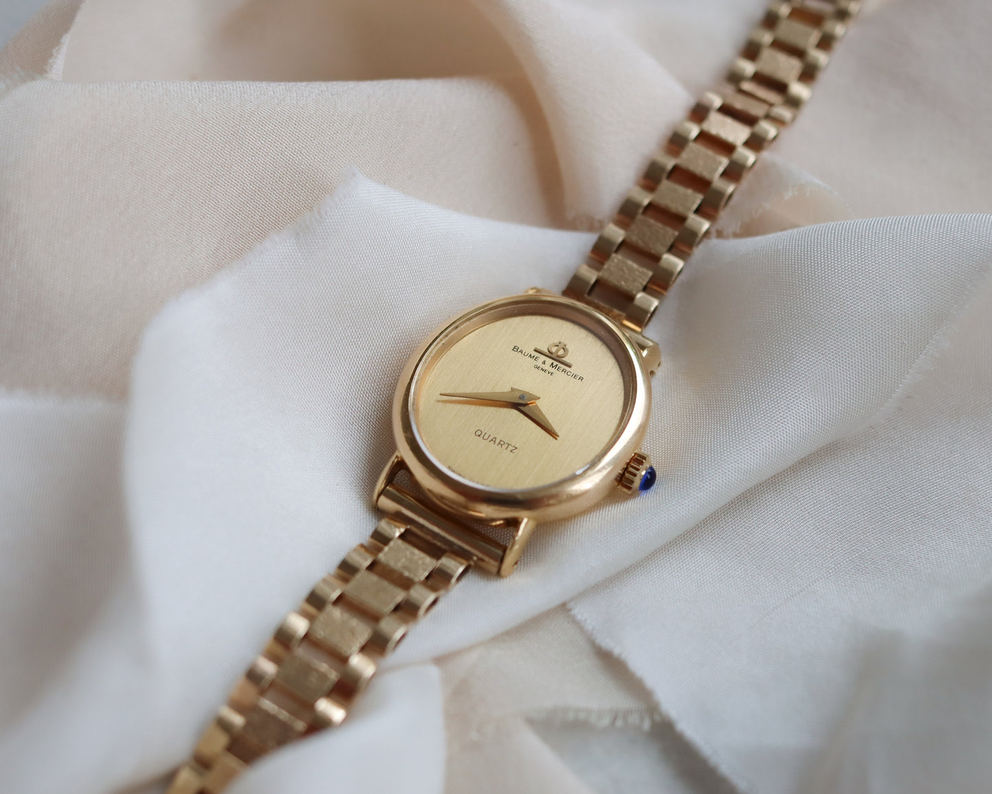 18ct gold 1980's Baume & Mercier oval quartz watch
