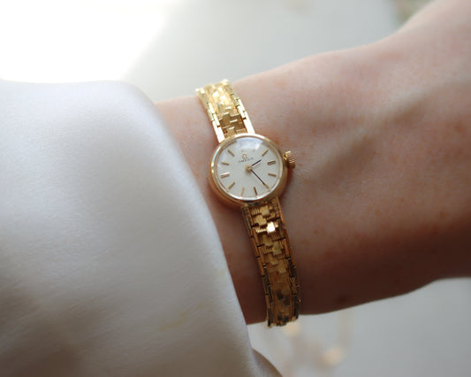 Sensational 18ct gold Omega watch with fancy link bracelet