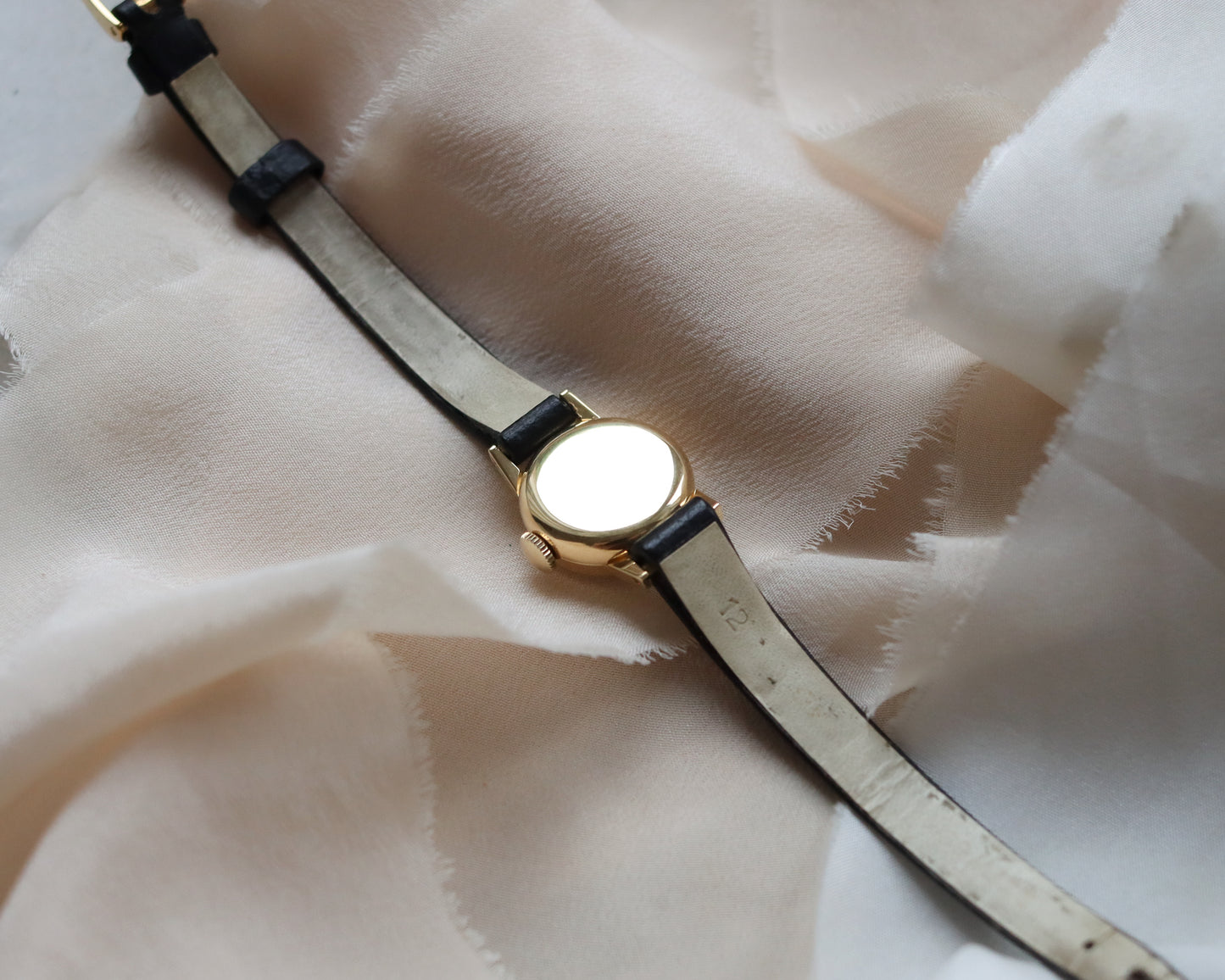 18ct gold Omega Saphette with black leather strap 1958