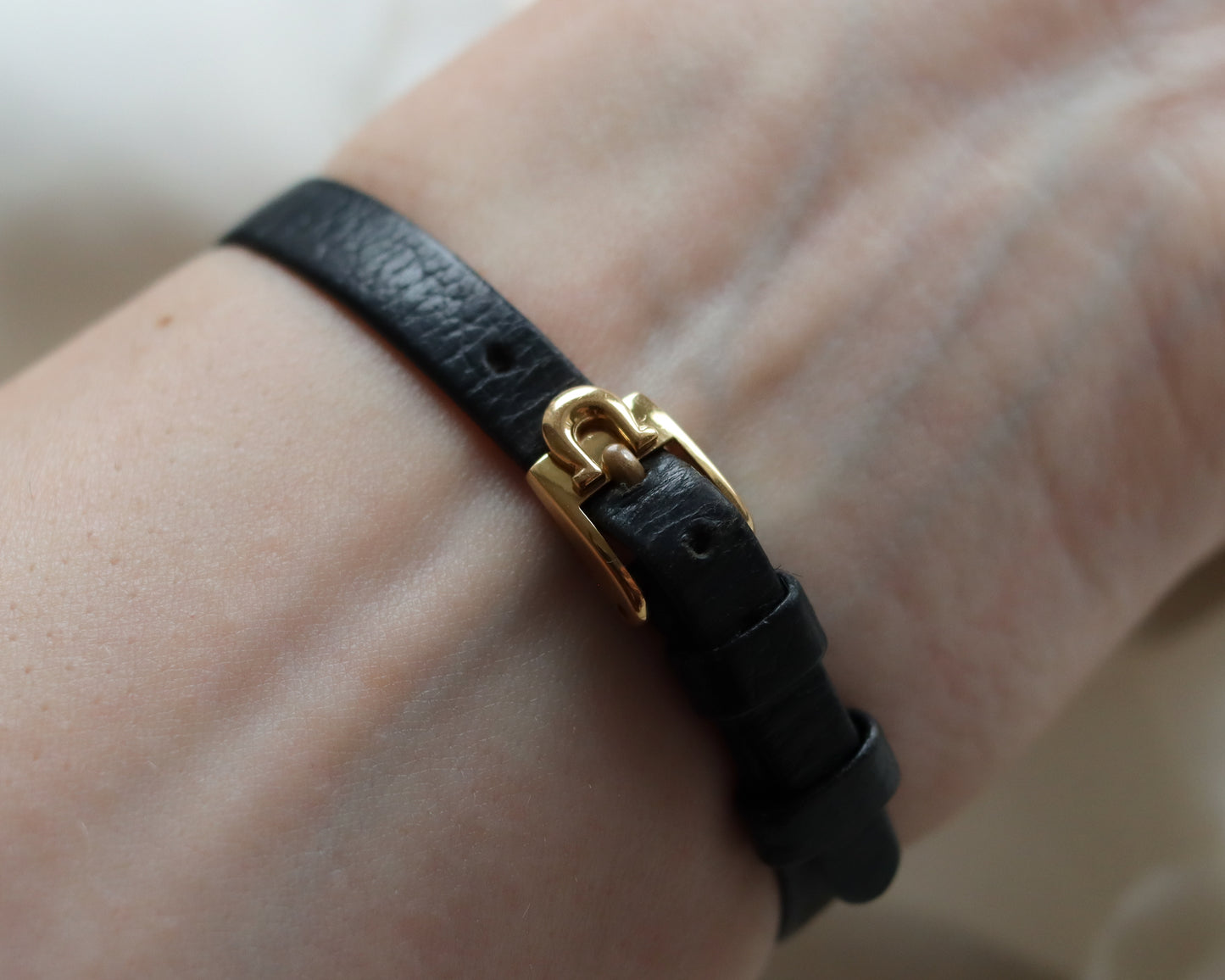 18ct gold Omega Saphette with black leather strap 1958