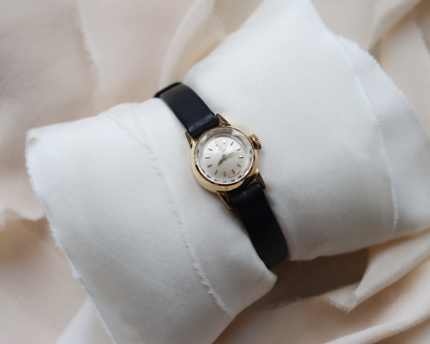 18ct gold Omega Saphette with black leather strap 1958