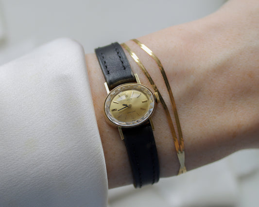 18ct gold Rolex Precision black leather watch with pink clamshell box