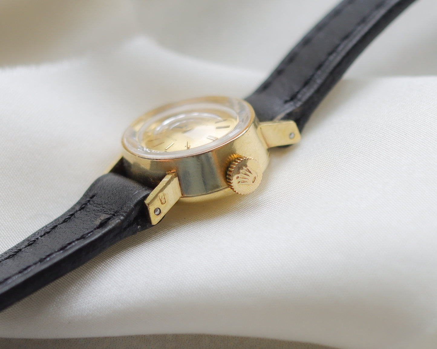 18ct gold Rolex Precision black leather watch with pink clamshell box