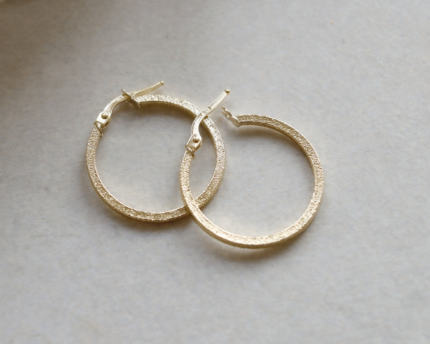 18ct Gold textured hoop earrings