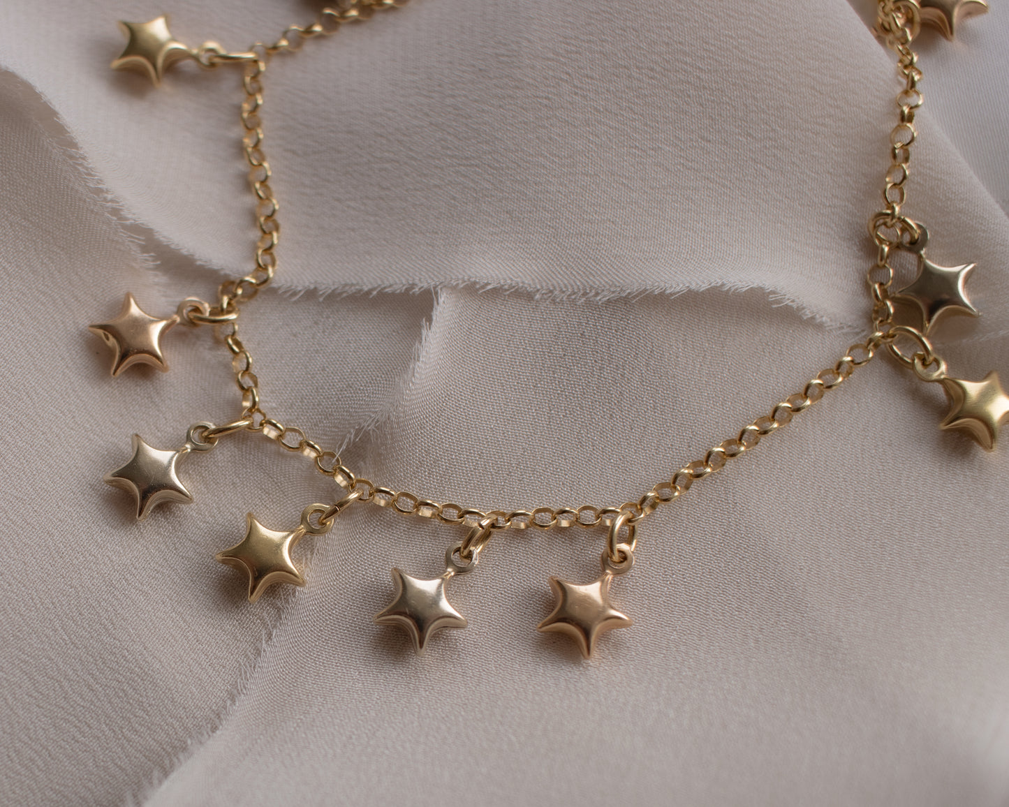 18ct Gold Multi-Tone Star Charm Bracelet