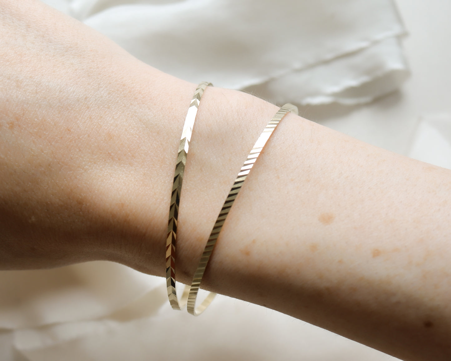 9ct gold chevron patterned bangle