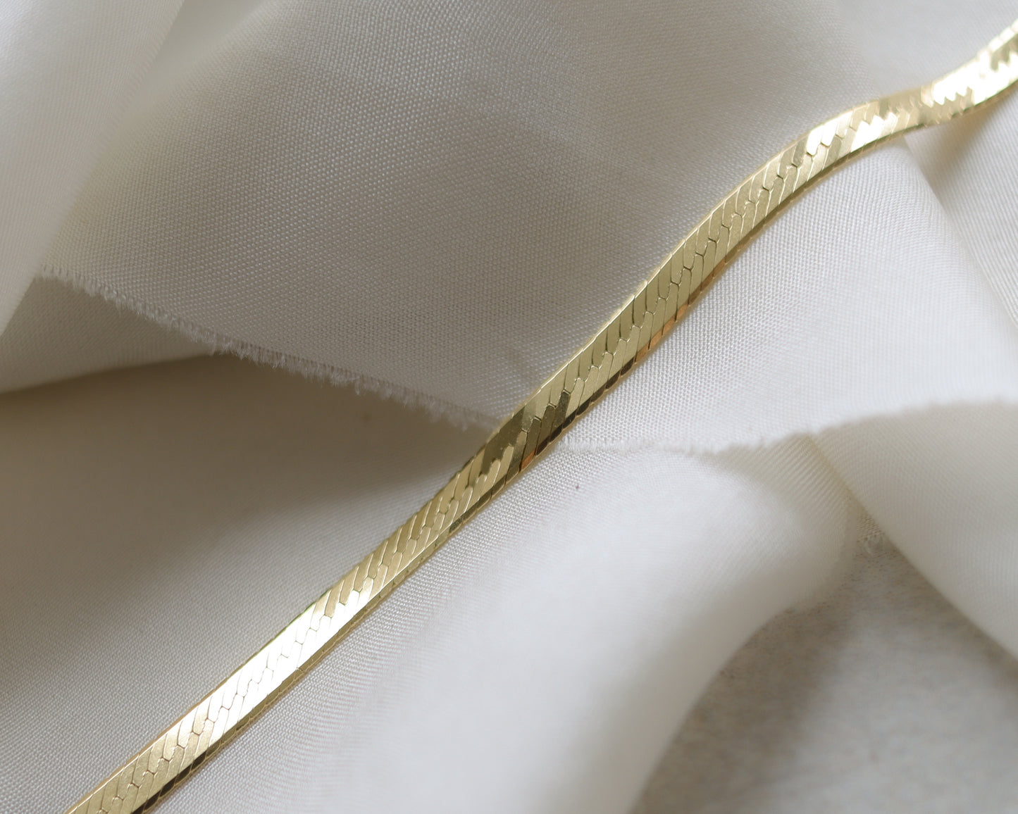 9ct gold flat herringbone bracelet