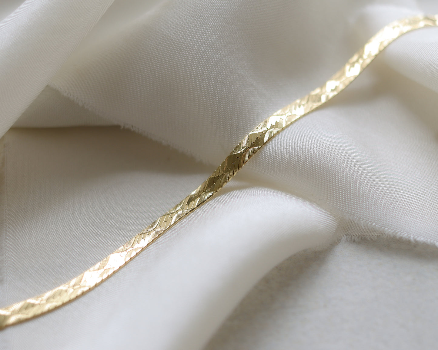 9ct gold flat herringbone bracelet