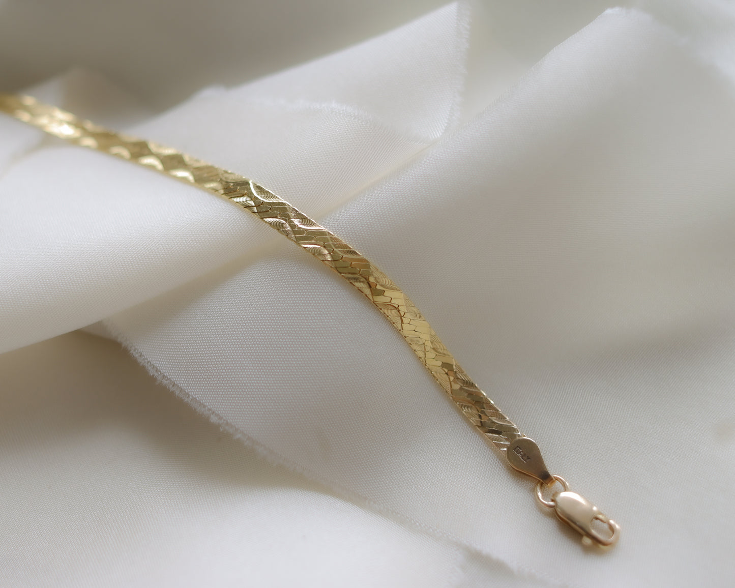 9ct gold flat herringbone bracelet