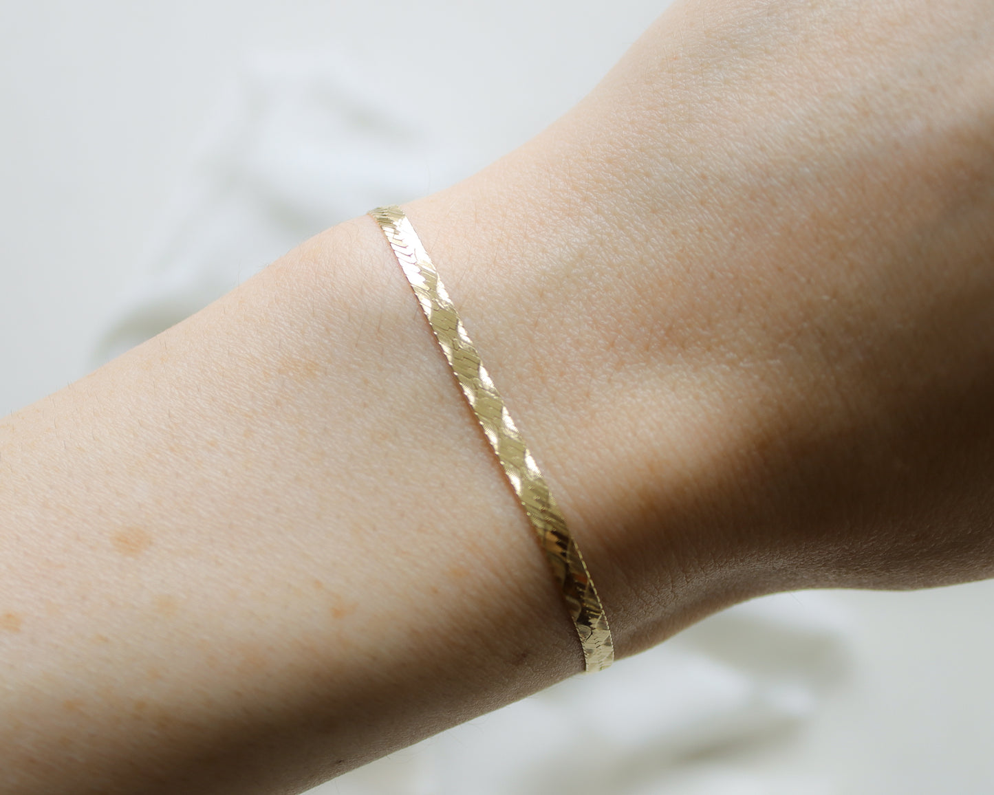 9ct gold flat herringbone bracelet