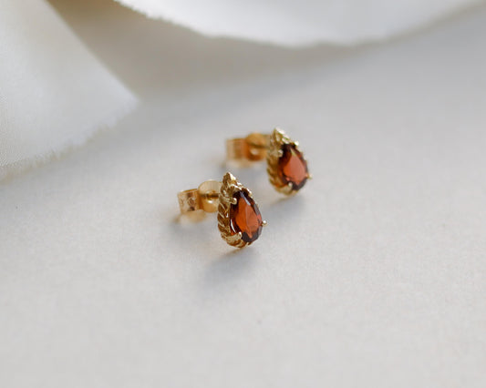 9ct gold pear shaped garnet stud earrings