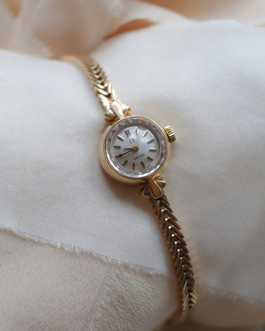 9ct Gold Omega faceted crystal herringbone watch - 1965