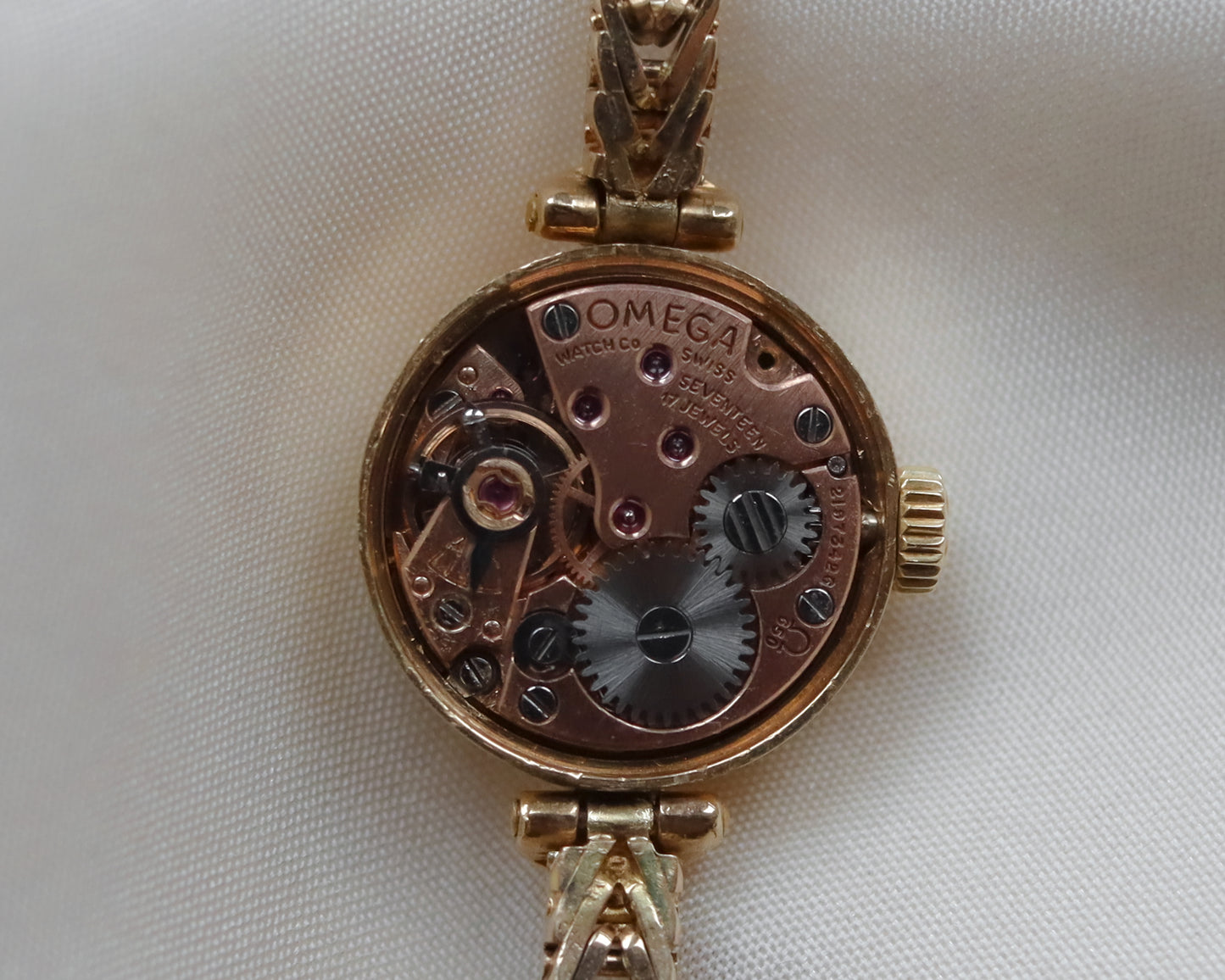 9ct Gold Omega faceted crystal herringbone watch - 1965