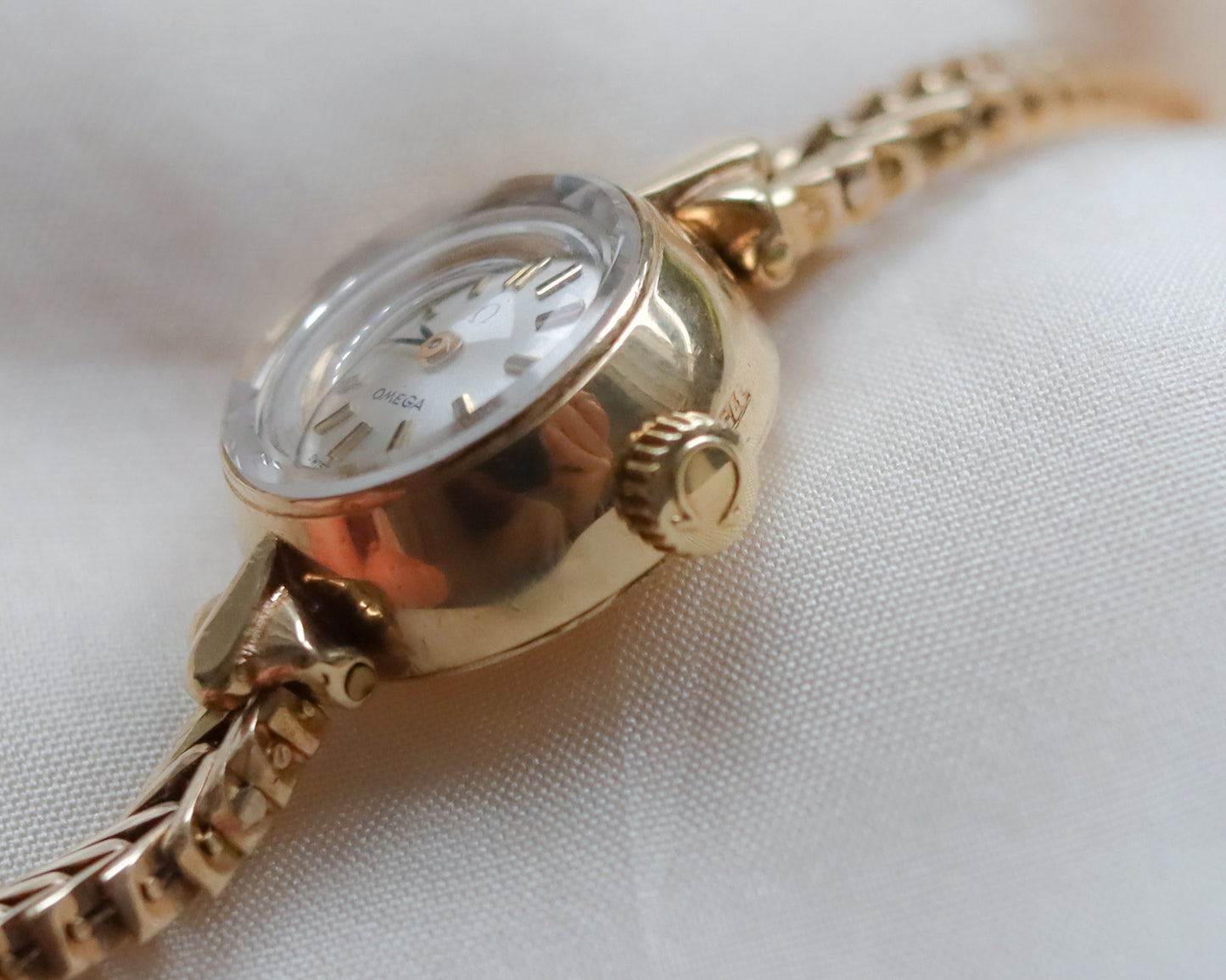 9ct Gold Omega faceted crystal herringbone watch - 1965