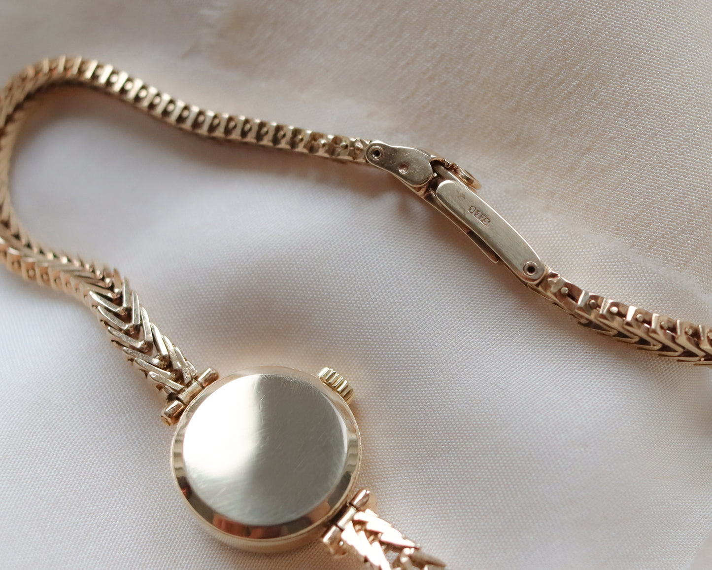 9ct Gold Omega faceted crystal herringbone watch - 1965