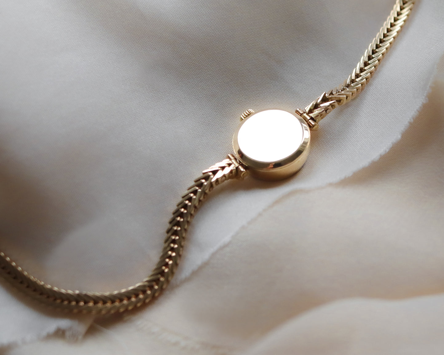 9ct Gold Omega faceted crystal herringbone watch - 1965