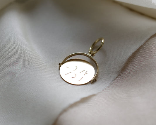 Vintage 9ct gold I Love You spinner pendant