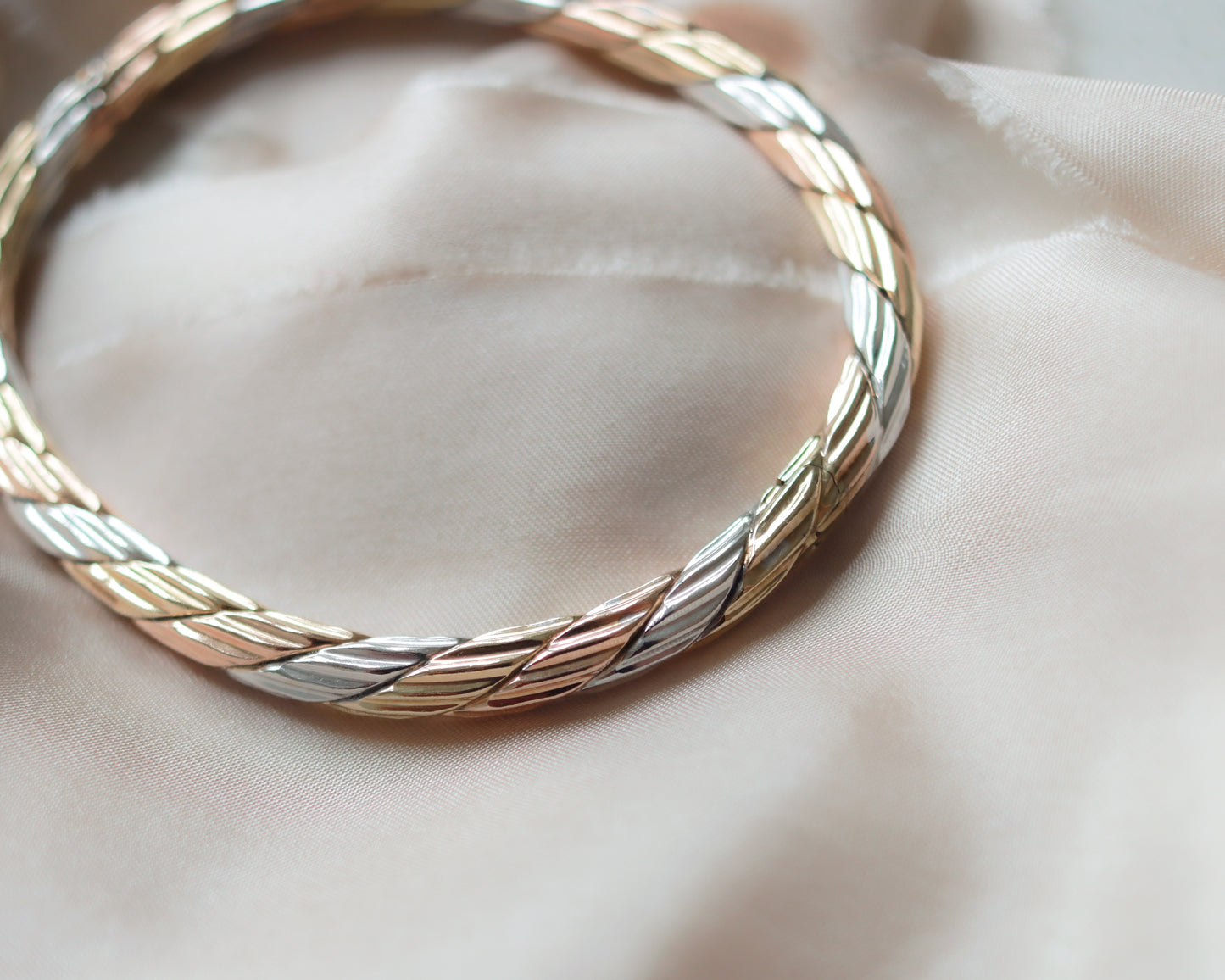 solid gold tri-coloured oval bangle