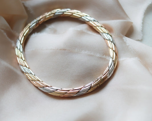 solid gold tri-coloured oval bangle
