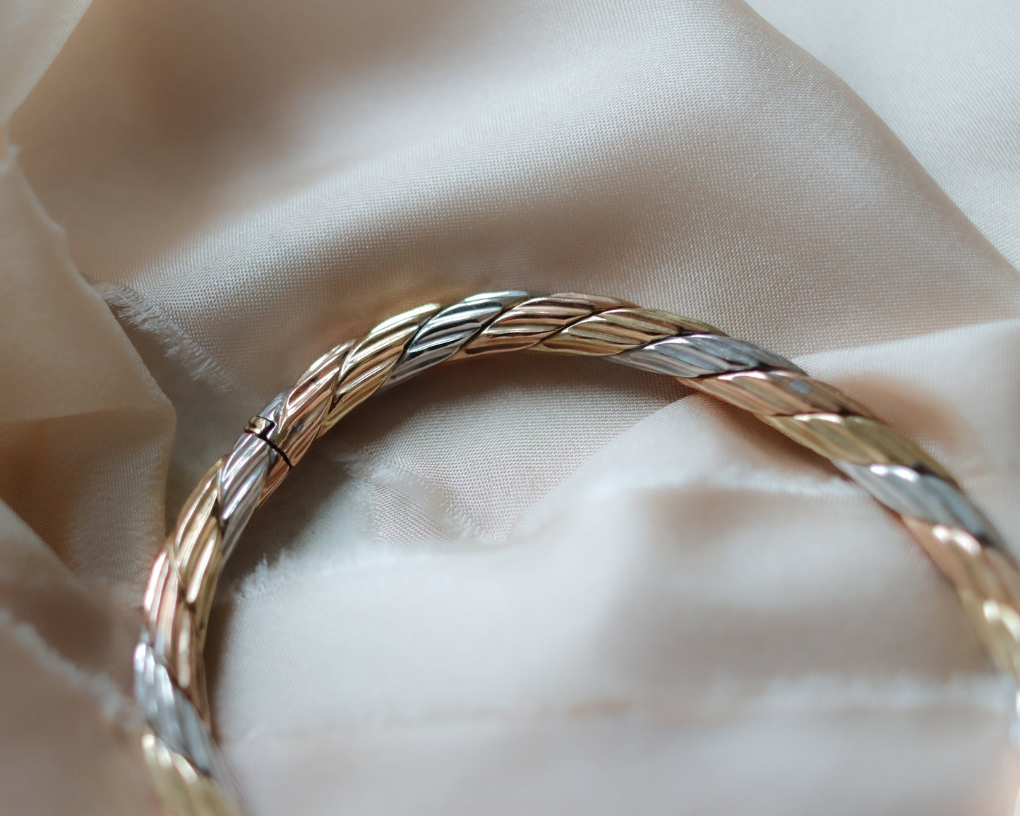 solid gold tri-coloured oval bangle