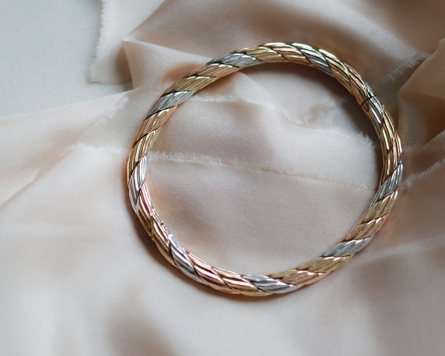 solid gold tri-coloured oval bangle