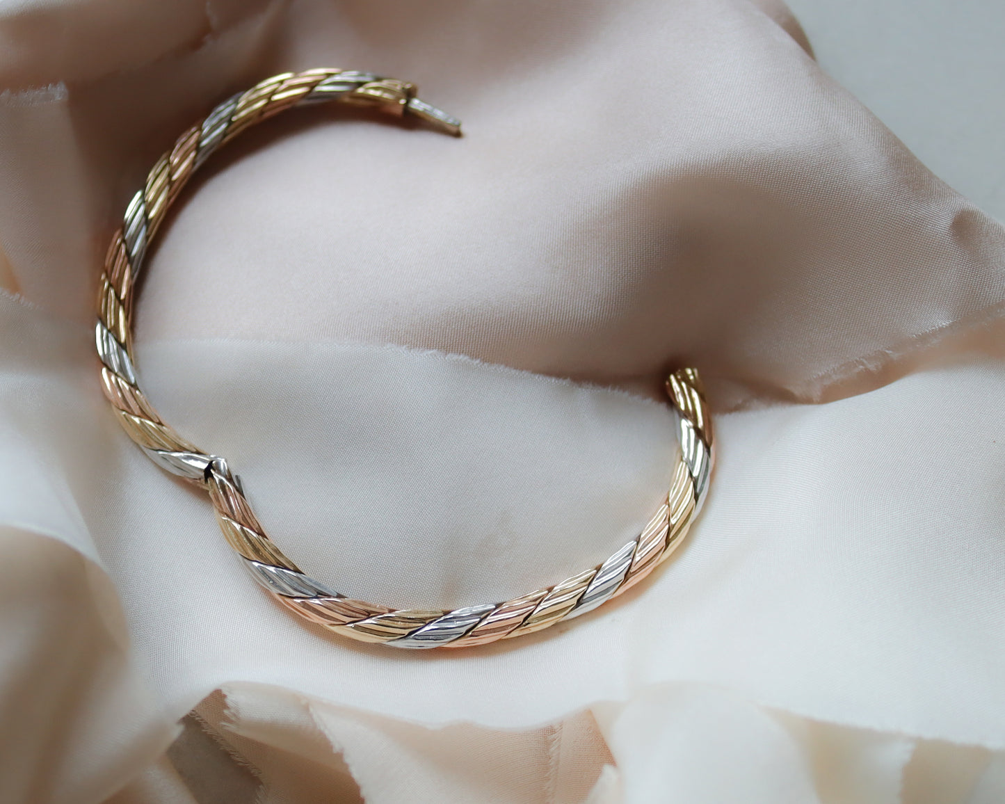 solid gold tri-coloured oval bangle