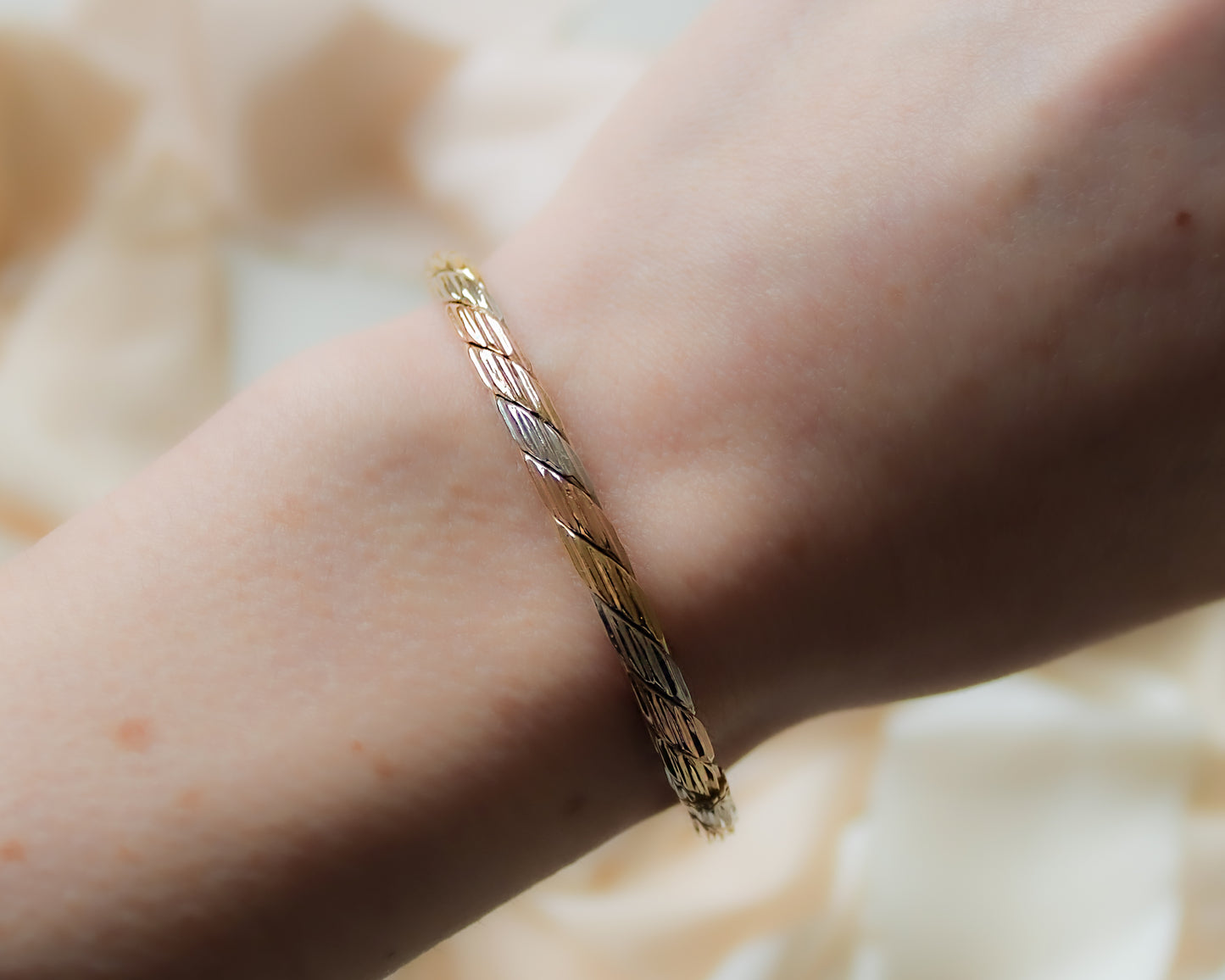 solid gold tri-coloured oval bangle