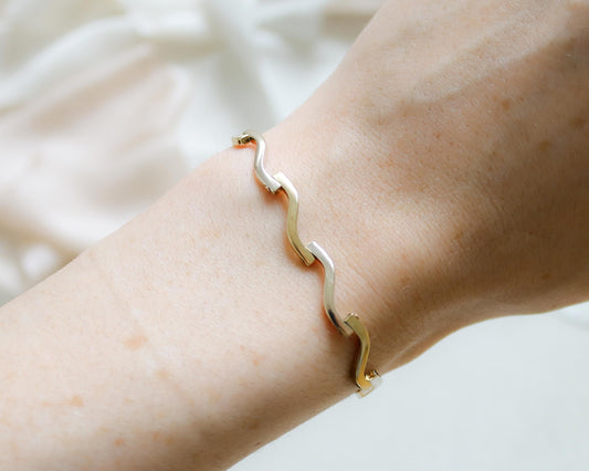 9ct gold bi-colour hinged bracelet