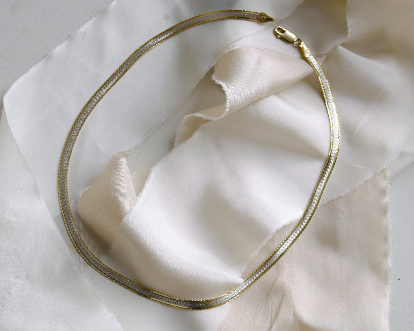 flat link herringbone necklace in 9ct white and yellow gold