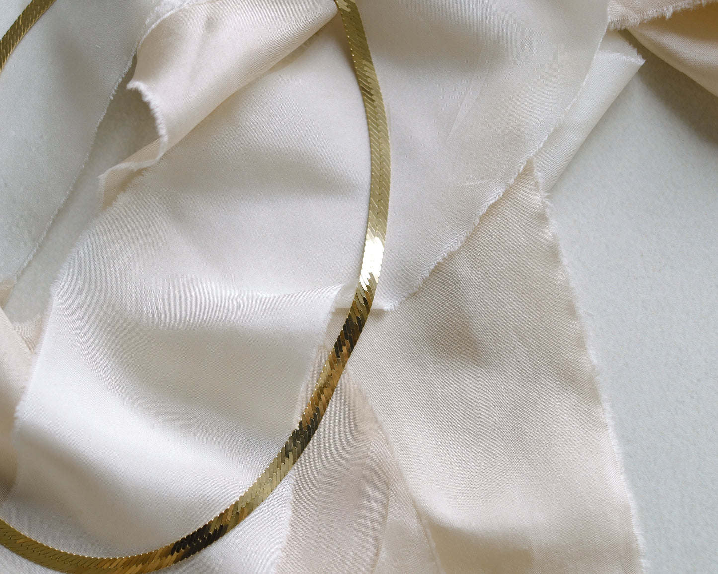 flat link herringbone necklace in 9ct white and yellow gold