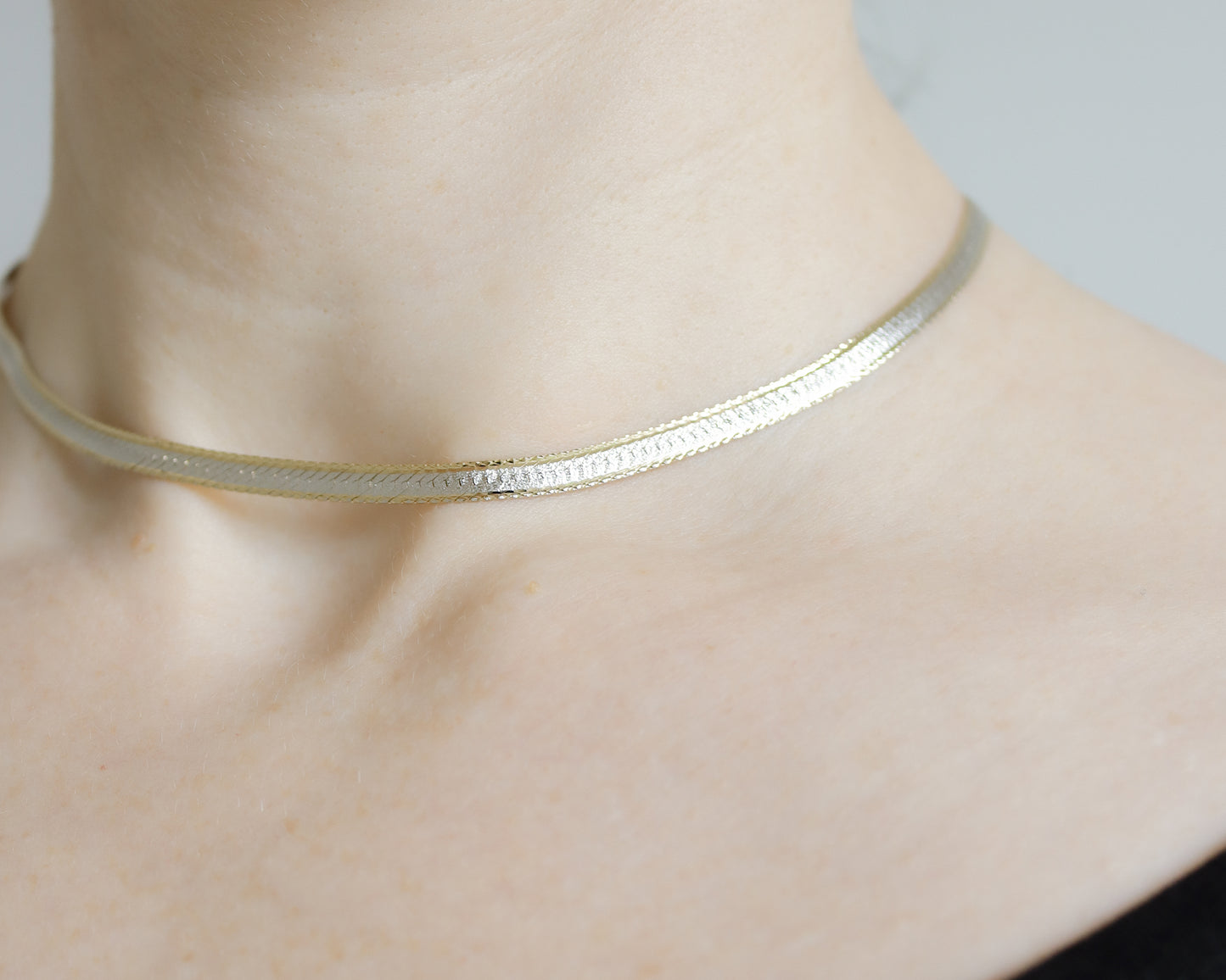 flat link herringbone necklace in 9ct white and yellow gold
