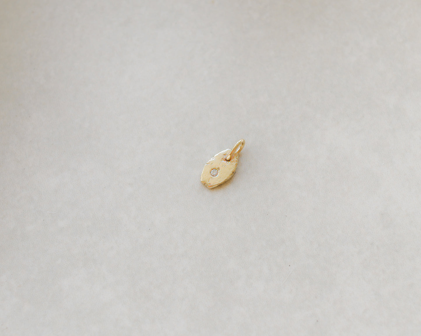 9ct yellow gold rustic oval smaller diamond charm pendant