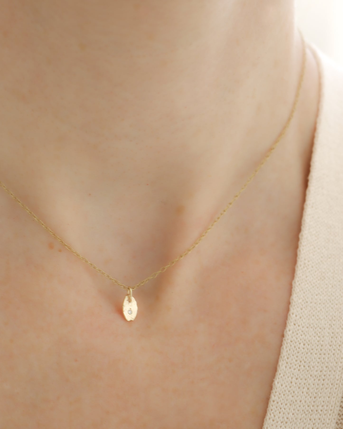 9ct yellow gold rustic oval smaller diamond charm pendant