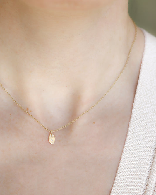 9ct yellow gold rustic oval smaller diamond charm pendant