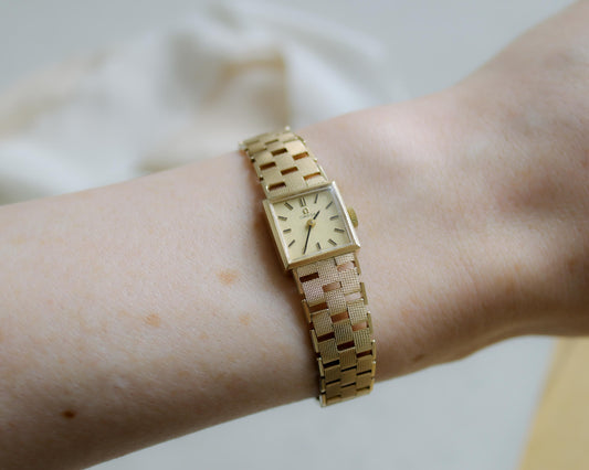 9ct yellow gold brick-link Omega watch from the 80's