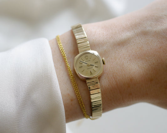 Rolex ladies solid gold wrist watch