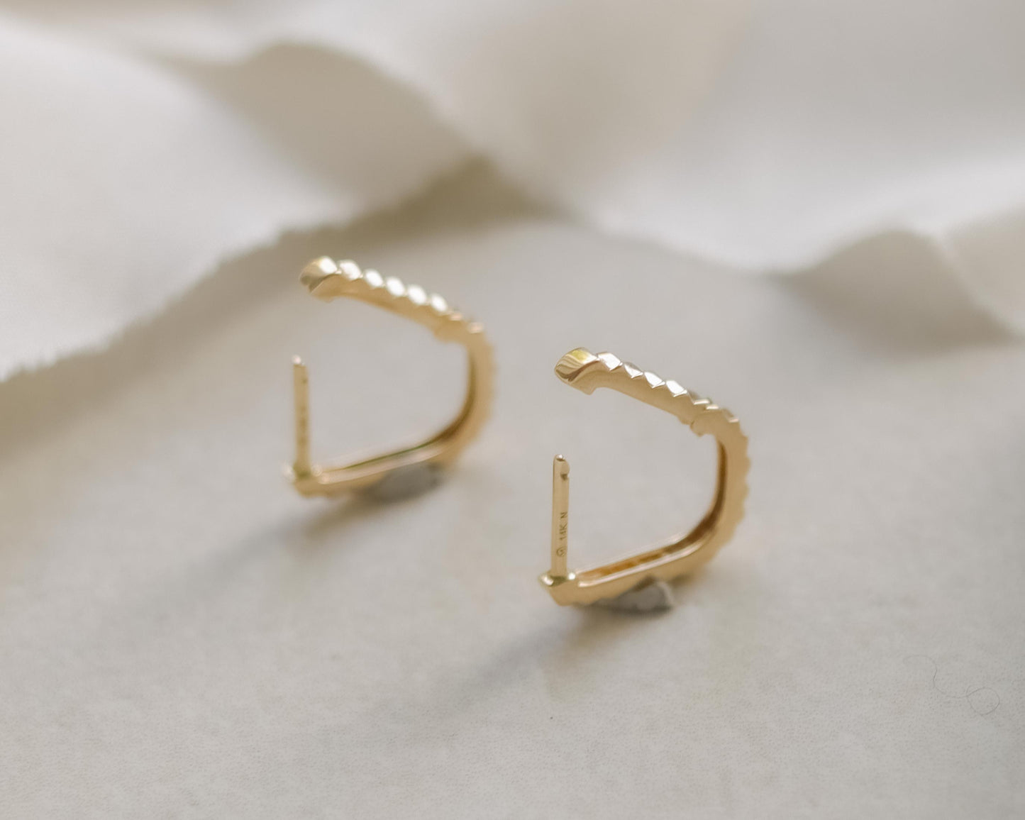 14ct gold early Messika huggie earrings