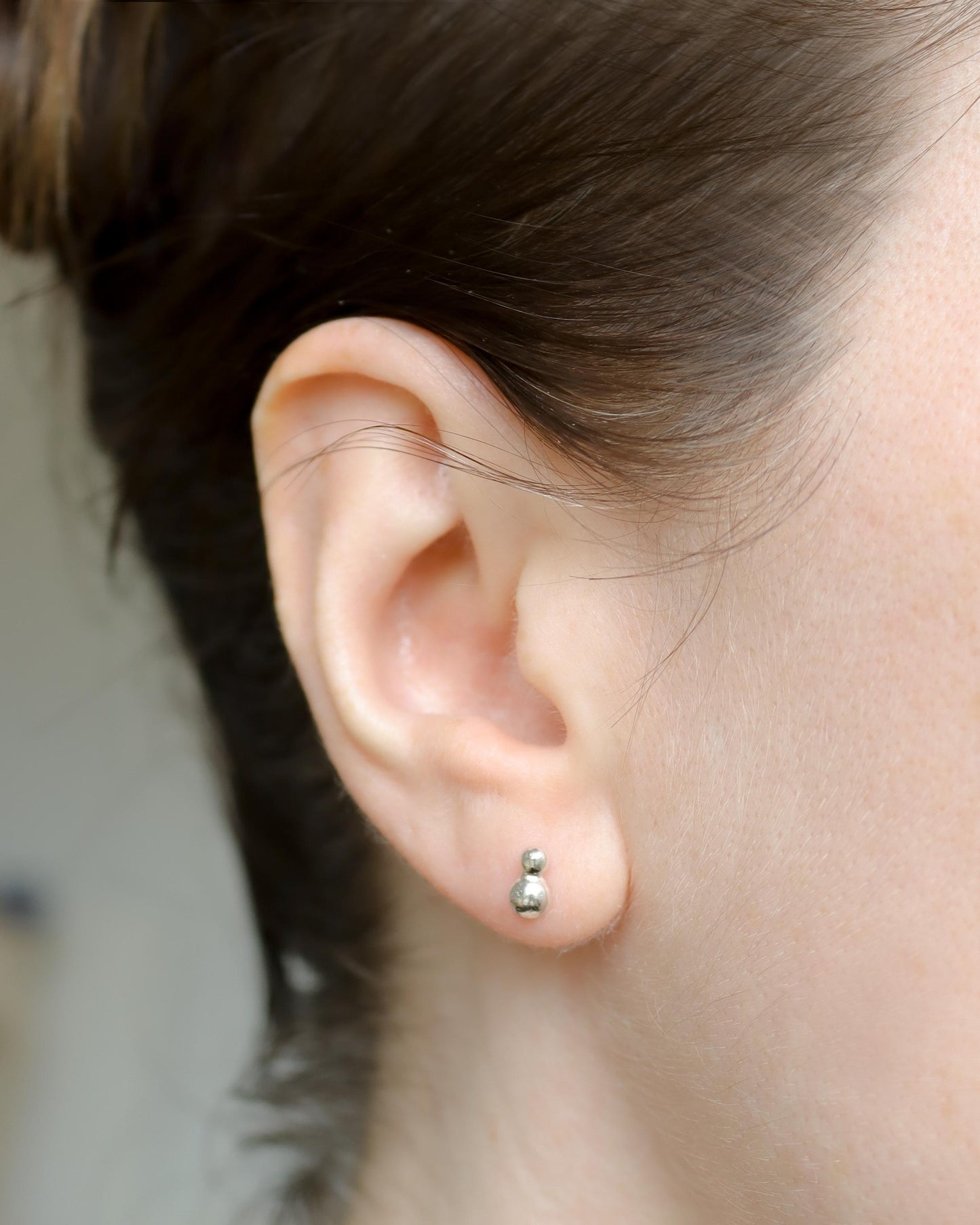 Sterling silver pear stud earrings.